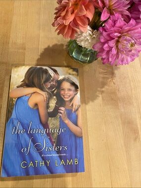 Softcover Book “The Language of Sisters”